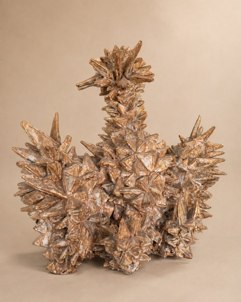 Spiky crystalline cluster in tan glaze. Ceramic sculpture by Ted Fullwood