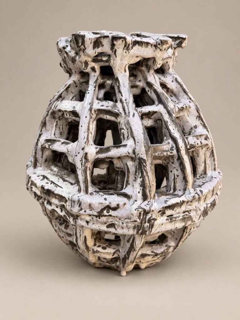 White open lattice urn. Ceramic sculpture by Ted Fullwood